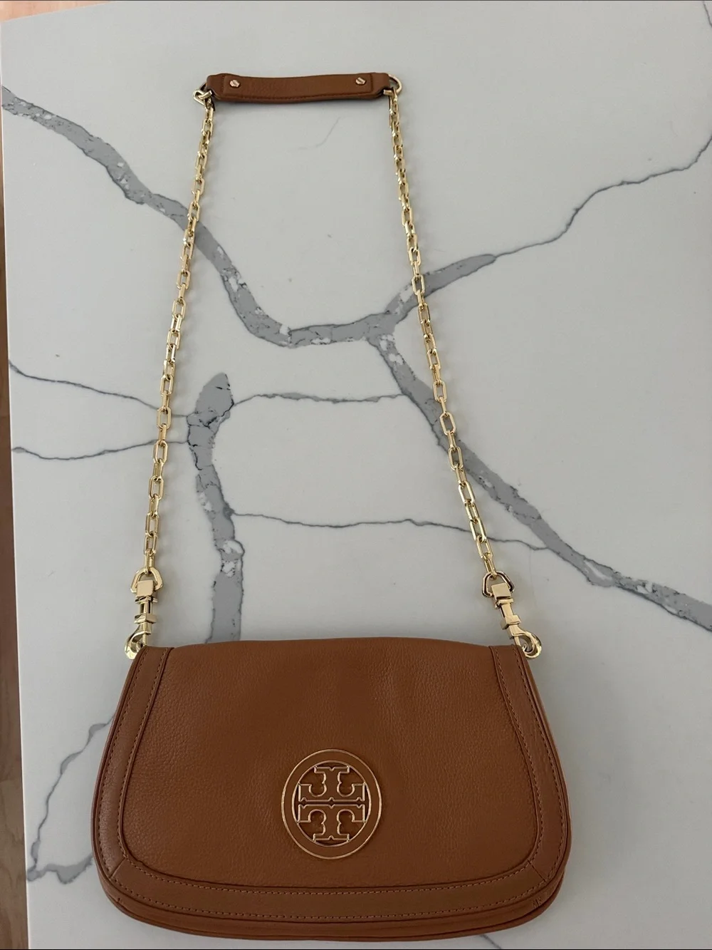 Tory Burch Amanda Logo Clutch in Royal Tan with Gold and Tan Logo on the front